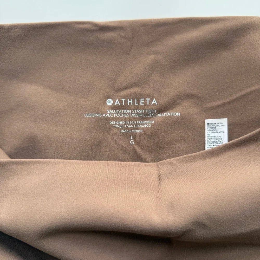 Athleta Salutation Stash Tight Size Large